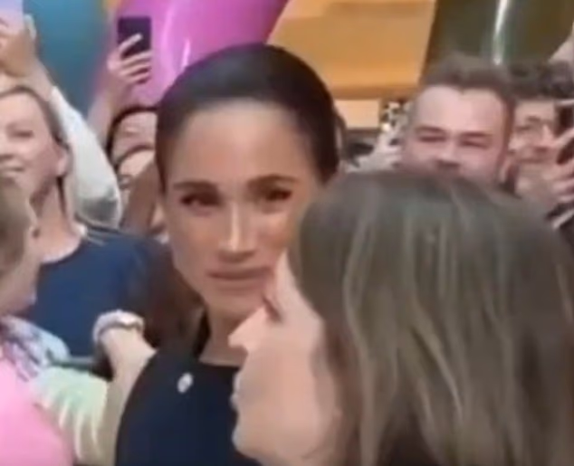 The familiarity and interruption did not seem to please the duchess, who turned to Ms Fosmo with a killer glare before grabbing her husband and moving on in the hospital crowd.