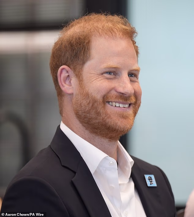 Prince Harry, pictured today at a Diana Award event, met his father for the first time in 19 months as they start to rebuild their relationship