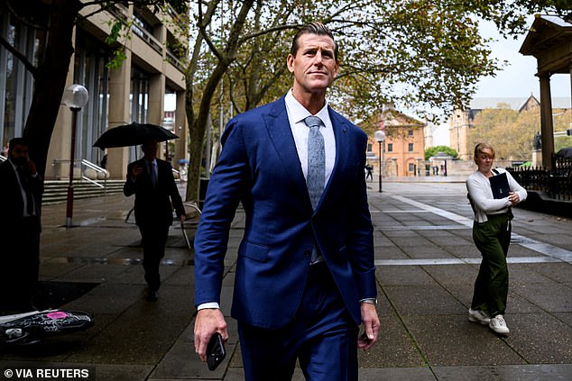 FILE PHOTO: Former Australian Defence Force soldier Ben Roberts-Smith walks during a break outside the Federal Court of Australia, in Sydney, Australia, May 1, 2025.  AAP/Bianca De Marchi via REUTERS/File Photo    ATTENTION EDITORS - THIS IMAGE WAS PROVIDED BY A THIRD PARTY. NO RESALES. NO ARCHIVE. AUSTRALIA OUT. NEW ZEALAND OUT. NO COMMERCIAL OR EDITORIAL SALES IN NEW ZEALAND. NO COMMERCIAL OR EDITORIAL SALES IN AUSTRALIA.     TPX IMAGES OF THE DAY
