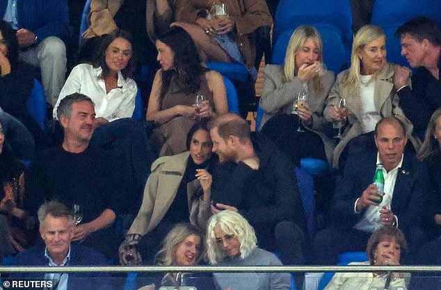 Britain's Prince Harry and Meghan, Duchess of Sussex, attend the NSW Waratahs versus Moana Pasifika rugby match at Allianz Stadium, Sydney, Australia, April 17, 2026. REUTERS/Hollie Adams