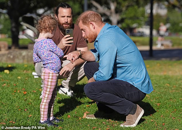 The Duke of Sussex meets Heidi, 3, and her father Rohan Davies at the Scar Tree Walk in Melbourne, Victoria, on day three of the royal trip to Australia. The Scar Tree Walk is a journey connecting traditional and contemporary Aboriginal cultures and histories of the Kulin Nation. Picture date: Thursday April 16, 2026. PA Photo. Photo credit should read: Jonathan Brady/PA Wire