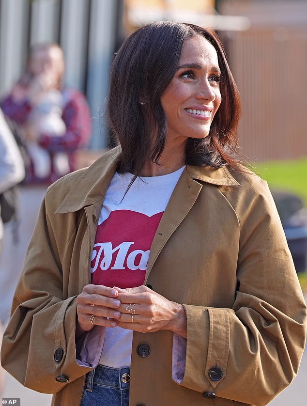 Meghan, 44, wore a $40 white t-shirt with a red love heart that said 'mama' designed by her best friend Kelly McKee Zajfen while on Melbourne’s Scar Tree Walk