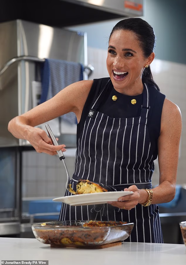 The Duchess of Sussex was inundated with compliments as she served up lunch to homeless women at a shelter in Melbourne on the first day of her and Prince Harry's four-day trip