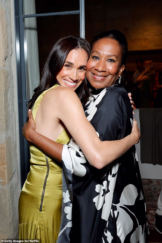 Meghan Markle put on an 'exaggerated' show of attachment at a recent Netflix party as she 'performed' her friendship with CEO Ted Sarandos's wife