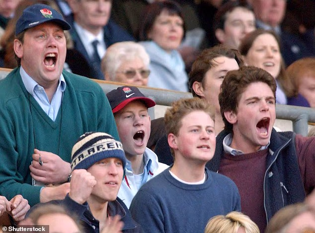 Prince William pictured watching a rugby match with Guy Pelly in February 2002 - not long after they first met