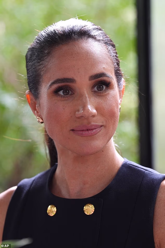 Meghan Markle (pictured) was inundated with compliments yesterday as she served up lunch to homeless women at a shelter in Melbourne during the first day of her and Prince Harry's four-day quasi-royal tour to Australia