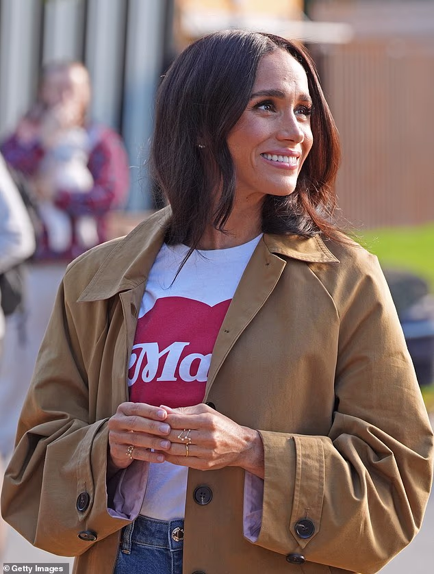 Meghan Markle supported her best friend, Kelly McLee Zajfen's charity Alliance of Moms by wearing the organisation's 'Mama' t-shirt