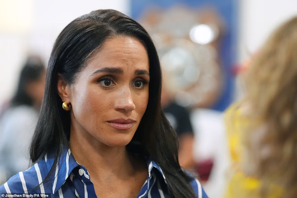 'Meghan arrived early to the church and waited with other families and friends in the pews and that she didn't use a separate entrance or have any special accommodations', they said. The source confirmed: 'Meghan travelled to Chicago over the weekend for the First Communion of the son of one of her best friends from college and that Meghan is the boy's godmother'. Natalie Martinez, a Chicago TV reporter whose daughter was also having her First Communion at the same Catholic mass, took a picture of her daughter walking past Meghan.