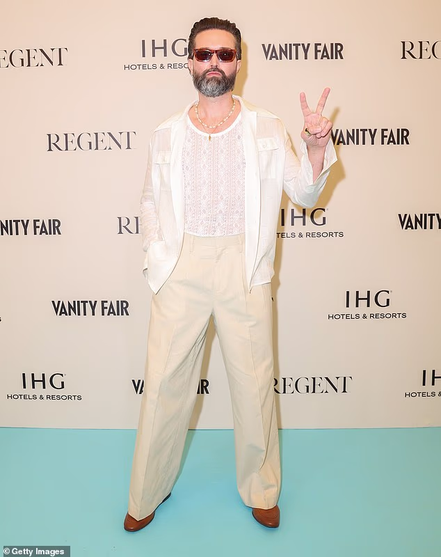 Emmett J. Scanlan, whose acting career began on Channel 4 soap opera Hollyoaks, posed for photos after landing in Cannes for this year's film festival