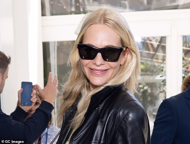 Cate greeted onlookers with a beaming smile after arriving at Cannes hotspot Hotel Martinez