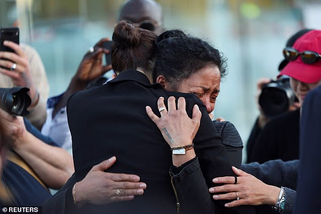 Some members of the crowd, which included bereaved families, were visibly emotional during their meetings with Meghan