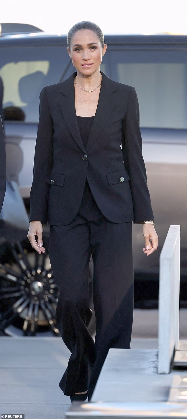 Meghan Markle appeared unusually 'tense and nervous' as she stepped out for a memorial ceremony in Switzerland on Sunday, according to body language expert Judi James