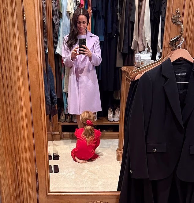 Meghan Markle shared a mirror-selfie of herself and daughter Lilibet on Instagram with the caption, 'Mama's little helper'