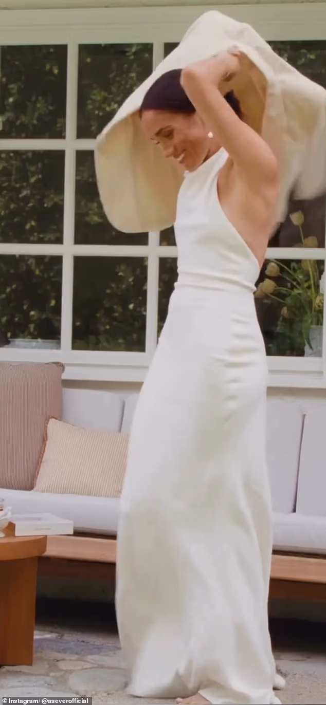 Meghan sported an Oscar de la Renta dress reminiscent of her second wedding day look by Stella McCartney