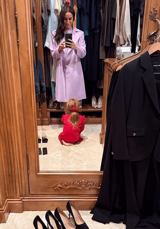 'Mama's little helper' was also recently spotted sitting on the floor of Meghan's walk-in wardrobe as the Duchess chose her outfits for the opening of the Lost Screen Memorial in Geneva in solidarity with those affected by online harm.