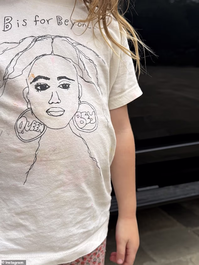 In addition to picture Archie from behind, Meghan appeared to also show off five-year-old Princess Lilibet, though she only focused on her 'B is for Beyonce' T-shirt