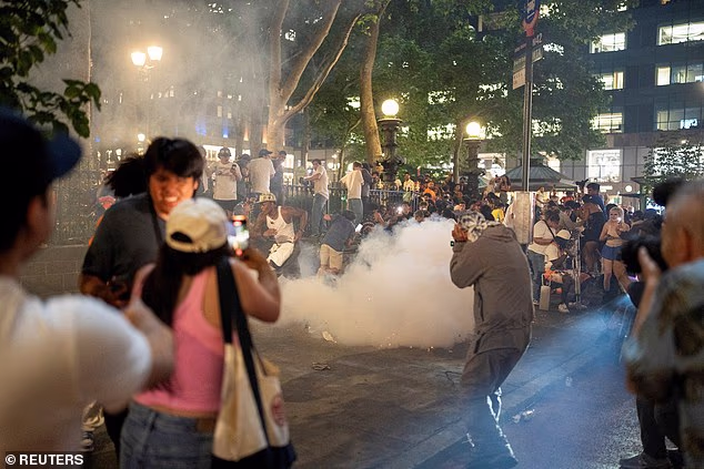 Fans set off flares at the Midtown park to celebrate the Knicks' long-awaited victory