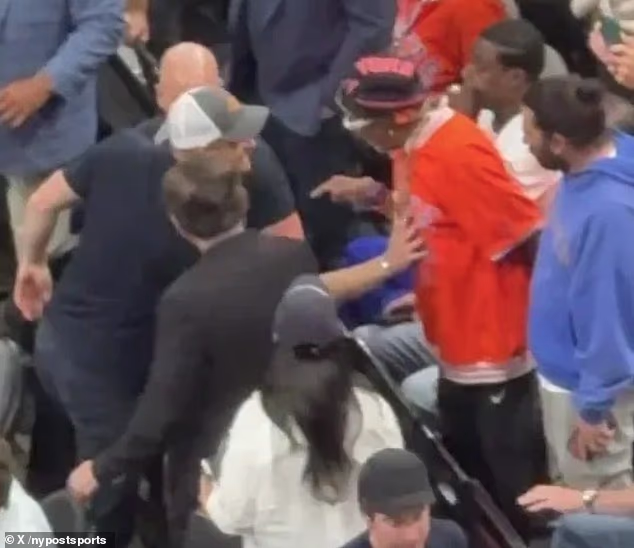 Spike Lee was filmed pointing animatedly at Prince Harry in an awkward moment for the exiled British royal at the NBA Finals over the weekend