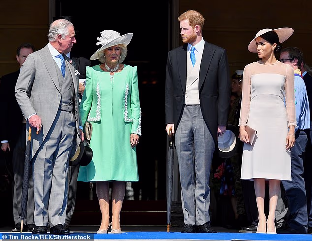 Prince Harry and Meghan with Charles and Camilla at Buckingham Palace in May 2018