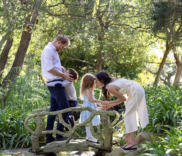 Prince Harry and his family have been offered royal accommodation when they come to England next month (Pictured: Harry and Meghan with children Archie and Lilibet).