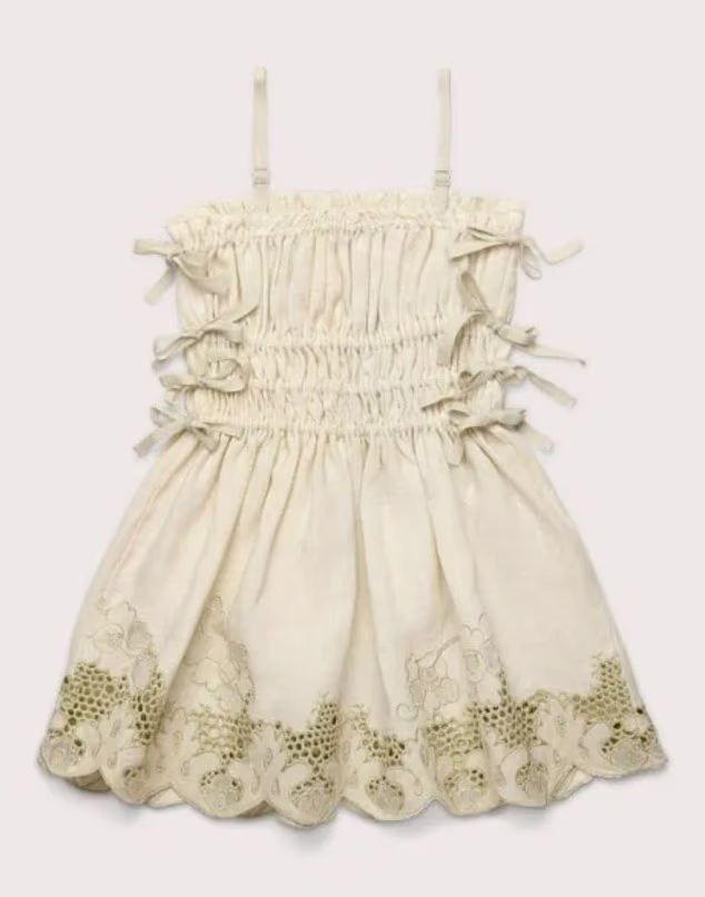 Alongside showcasing her long red hair, the young royal wore a £320 sundress from one of Meghan's favourite brands, Cult Gaia