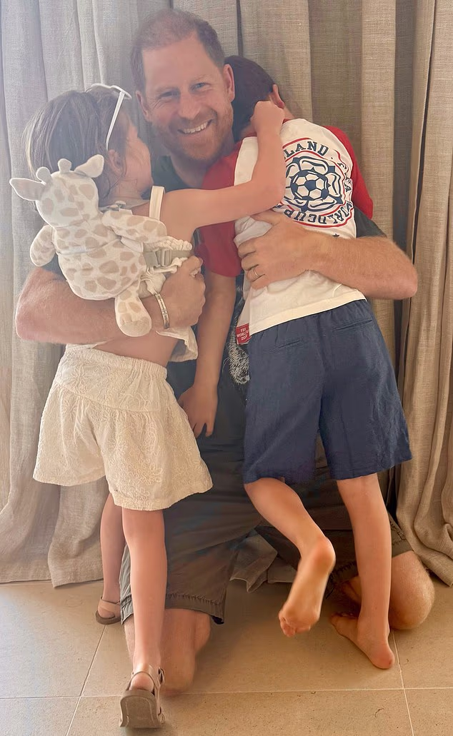 Harry with his children Lilibet and Archie, who he hopes to bring to the UK for a visit.