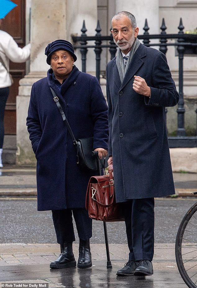 Baroness Doreen Lawrence outside at the High Court with friend and lawyer Imran Khan