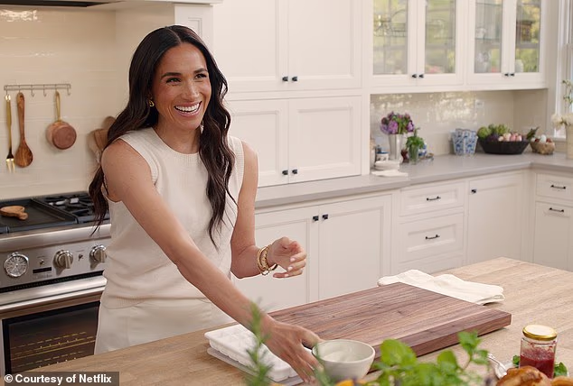 Meghan Markle (pictured on her show) has excitedly shared the news that her axed Netflix cooking series has been nominated for a surprise Daytime Emmy - eight years after she 'politely turned down' an invite to the glitzy awards ceremony