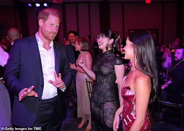 Harry shares a laugh with US Olympic skating stars Alysa Liu and Madison Chock in New York