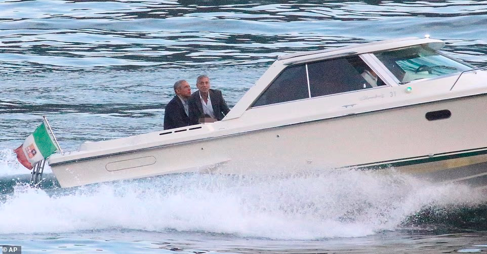 Barack Obama and his wife Michelle enjoyed a relaxing trip at George's Italian mansion back in 2019. Former president Barack and first lady Michelle, as well as their daughters Malia and Sasha joined the Clooneys at a charity dinner for The Clooney Foundation for Justice. They were spotted aboard a boat close to the couple's multi-million villa after attending the glamorous charity event. While they were in the area, the Obamas enjoyed the idyllic town of L'Isle-sur-la-Sorgue, with Malia and Sasha spotted in the famous market. Ahead of the former presidents arrival, George was reportedly left panicked after a plumbing disaster left the pool half full and ice-cold. Eager to impress their high-profile pals during their summer European getaway, George asked his bodyguard Giovanni to call the local plumber Dante Pennè - who later detailed the pandemonium he was met with when he visited the property. Dante was roped in at the last minute to fix the problem at hand before the Obamas made their arrival. Unaware at the time as to who the Clooneys were expecting, the plumber admitted he quipped back: 'Let me work, otherwise I won’t be able to fix it.' Dante's talents were put to good use and within a few minutes he was able to sort and drain the thermometer. He revealed he was awarded for his efforts with a selfie with the 'worried' Ocean's Eleven star - who he noted was clad in a sweaty Casmigos t-shirt.