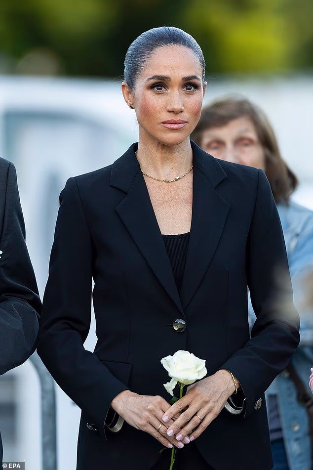 Meghan pictured without the jewel at the inauguration ceremony for the World Health Organisation's The Lost Screen memorial in Geneva in May