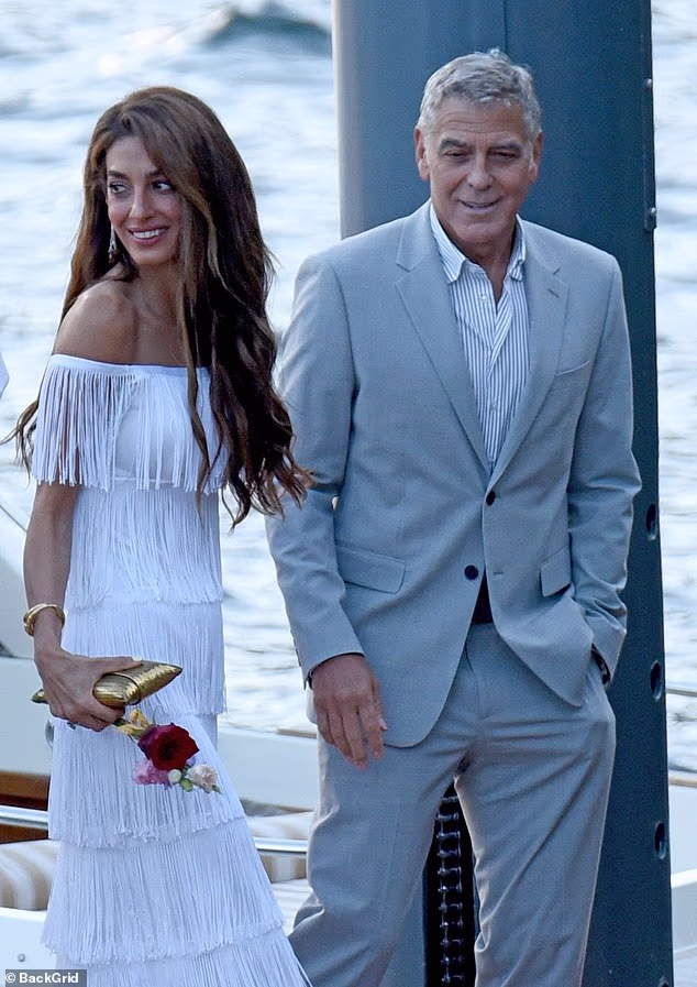 The dreamy mansion is where George, 65, first locked eyes with his wife Amal, 48, after she attended one of his lavish dinner parties in 2013. Above, the couple last year