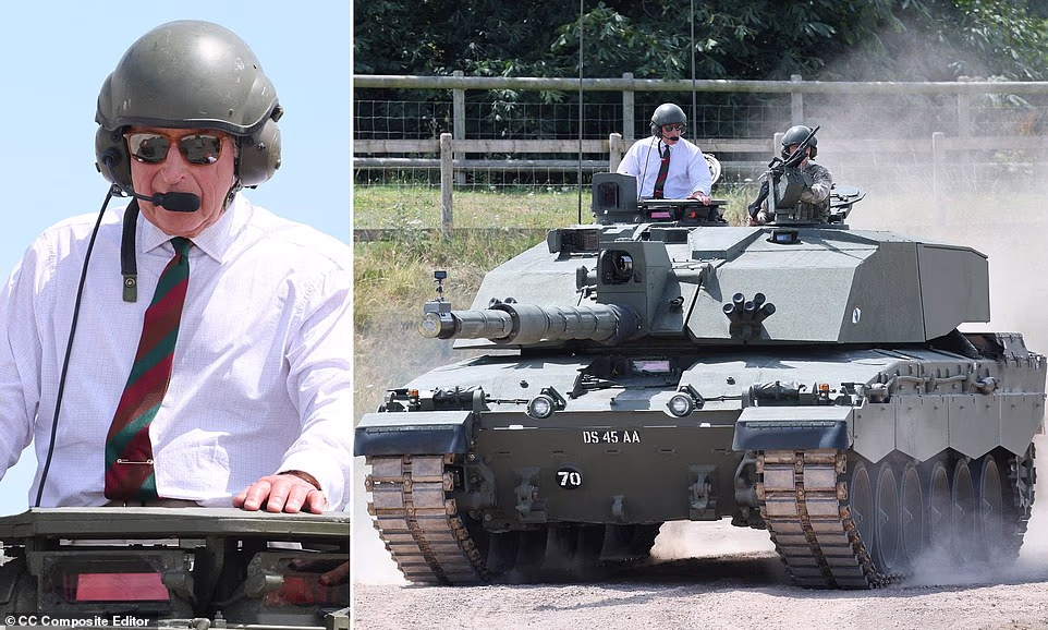 The King swapped regal finery for a crew guard helmet as he took a ride in a battle tank today, with the Royal Family determined to 'shut out the noise' surrounding Prince Harry's UK visit. Donning goggles, a white shirt, and a striped tie, Charles, 77, sat in the commander's seat as he was driven twice around a dirt track in a Challenger 2 in front of dozens of spectators at the Tank Museum in Bovington this afternoon. The King was heard remarking on the 'wonderful' demonstration by soldiers from the Royal Tank Regiment (RTR), recently back from deployment in Greece to be reunited with their loved ones at the annual Families' Day event. Just hours after a war of words broke out between Buckingham Palace and the Duke of Sussex over denying him accommodation at a royal residence for his visit to the UK this week, the King arrived at the museum in Dorset on the back of a 1920 Pattern Rolls-Royce Armoured Car. Soldiers from the RTR worked with museum curators to ready the oldest vehicle in the museum’s working fleet, which carried Queen Elizabeth II during a visit to the regiment in 1997, to deliver the King in front of dozens of servicemen and women on display for the event.
