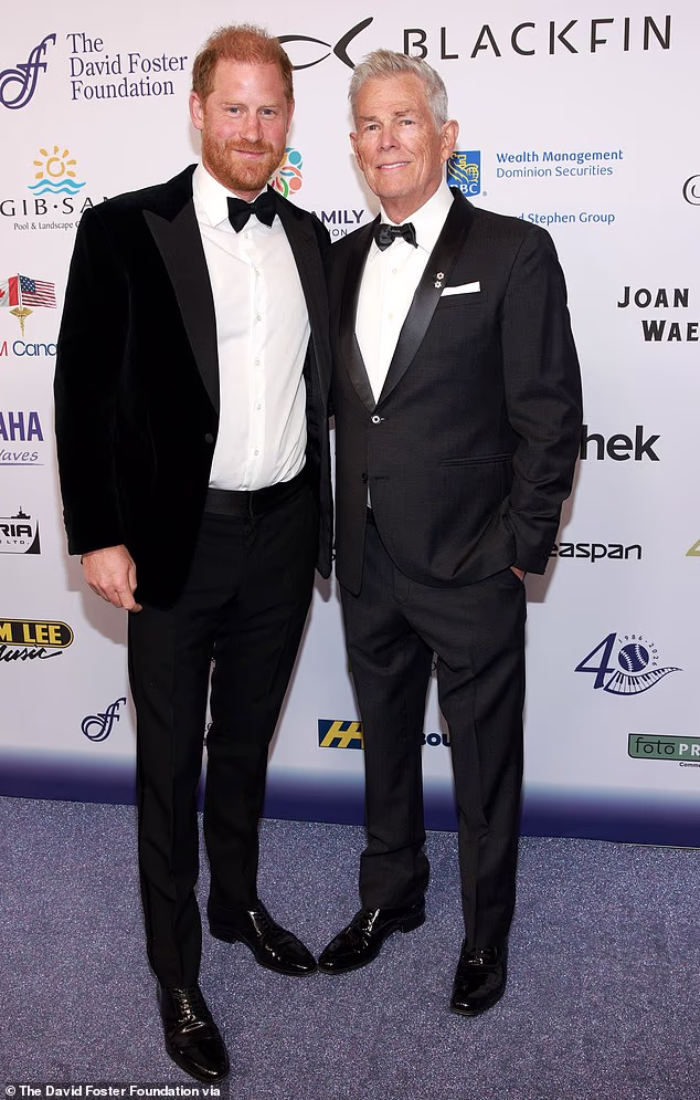 Prince Harry and David Foster pictured together in Victoria, British Columbia on Friday night