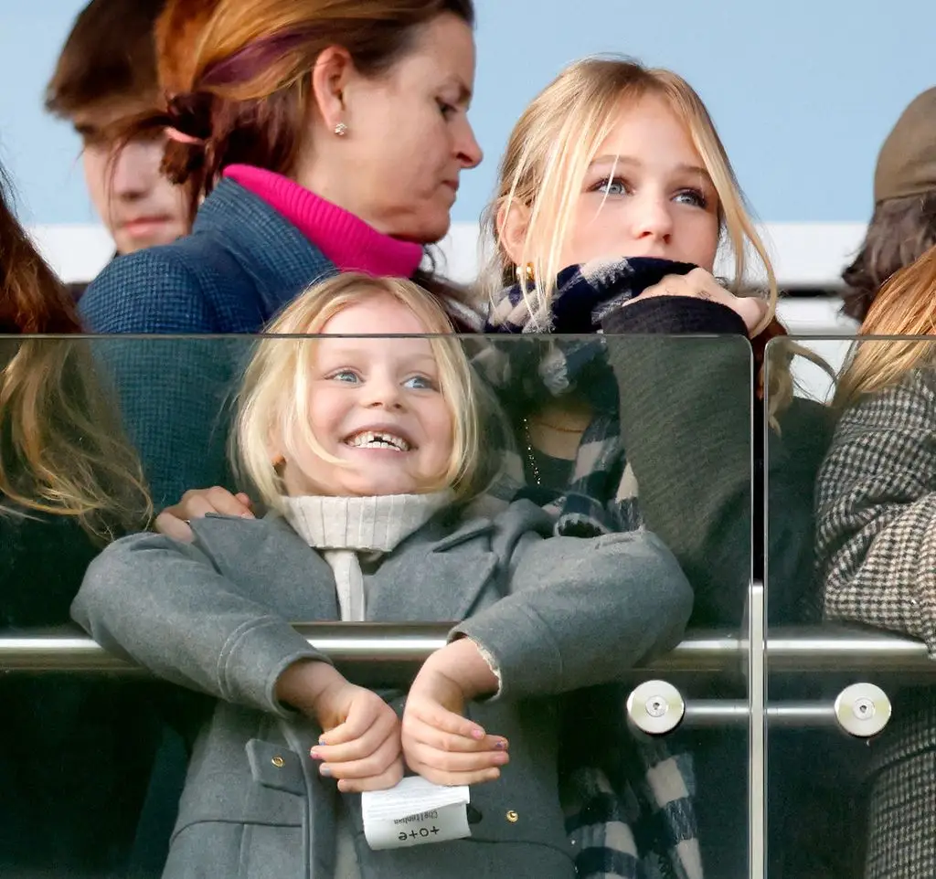 Lena Tindall and Isla Phillips watch the racing as they attend the New Year's Day Racing Meet at Cheltenham Racecourse on January 1, 2026 