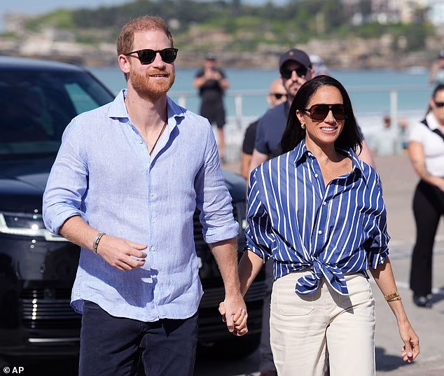 Some were quick to notice that the picture shared a striking resemblance to an old photo of her husband, Prince Harry's late mom, Princess Diana. Meghan with Prince Harry in April