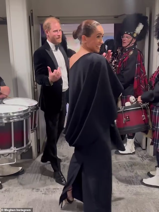 Meghan Markle joked with bagpipers as she attended an event to celebrate David Foster, the music mogul and close friend of the Sussexes