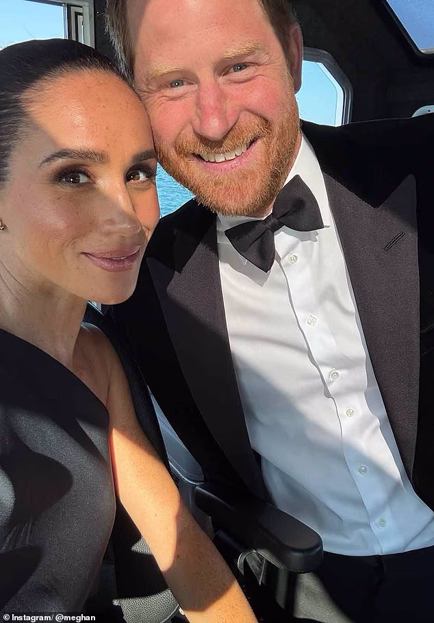 The Duke and Duchess of Sussex were captured 'jamming' at a gala in honour of David Foster on Friday night (Pictured before the event)