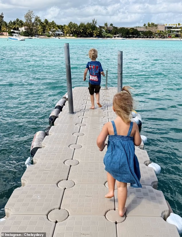 Prince Harry's ex-girlfriend Chelsy Davy has shared a rare glimpse at her glamorous island life in Mauritius with her children and hotelier husband with an image of her son Leo, four, and daughter, Chloe, two, running along a pontoon towards the glistening blue sea