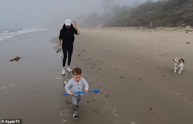 Archie’s fourth birthday falls on the same day as the King’s Coronation. Pictured: Archie walking along the beach with his mother and their pet beagle, Guy.