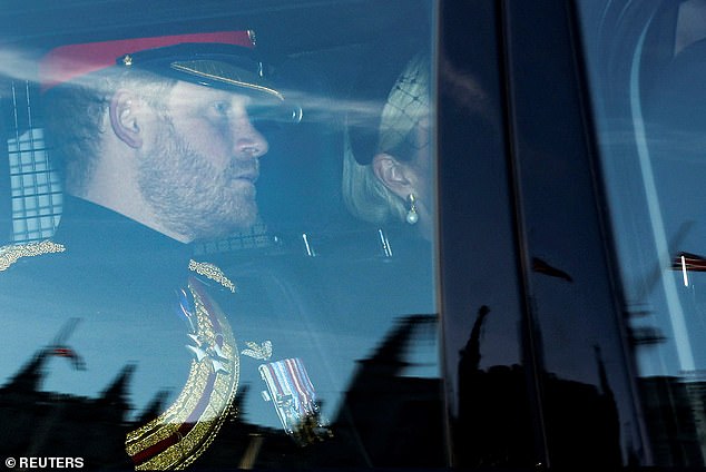 Prince Harry pictured arriving to attend a vigil as they pay their respects to the coffin of his grandmother Queen Elizabeth last night