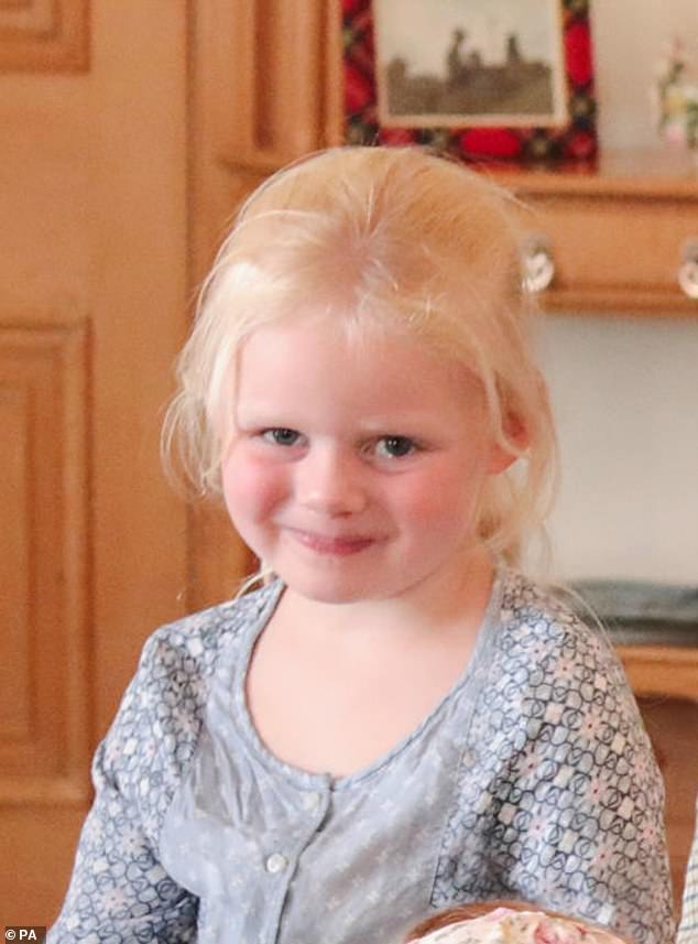 Lena Tindall four, offered her best cheeky smile to the camera as she and their cousin got their picture snapped up last summer