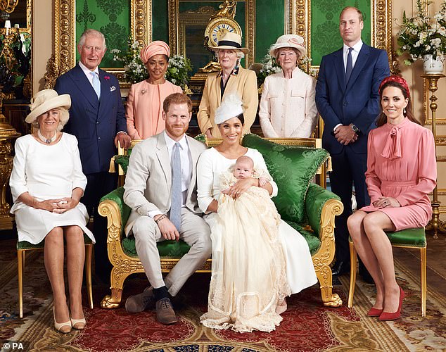 The Duke and Duchess of Sussex with their son Archie, and (left to right) the Queen Consort, the King, Ms Doria Ragland, Lady Jane Fellowes, Lady Sarah McCorquodale and the Prince and Princess of Wales at Windsor Castle after his christening in July 2019