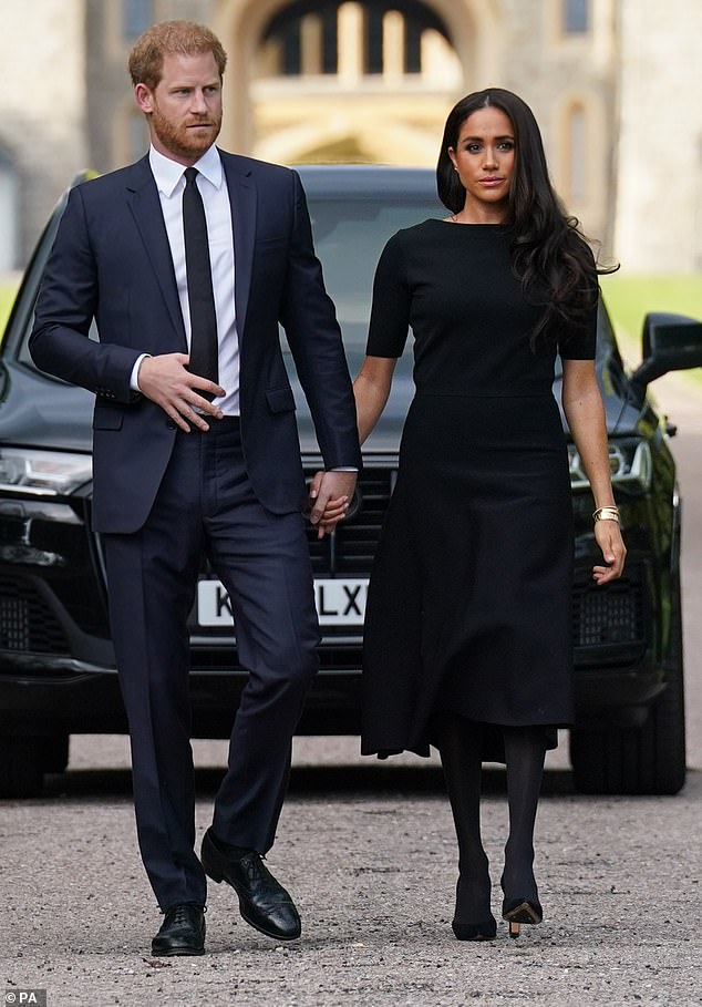 The US-based Duke and Duchess of Sussex (pictured in Windsor on Saturday) have reportedly confirmed they will be staying in Britain until the end of the royal mourning period, which finishes seven days after the service on September 19