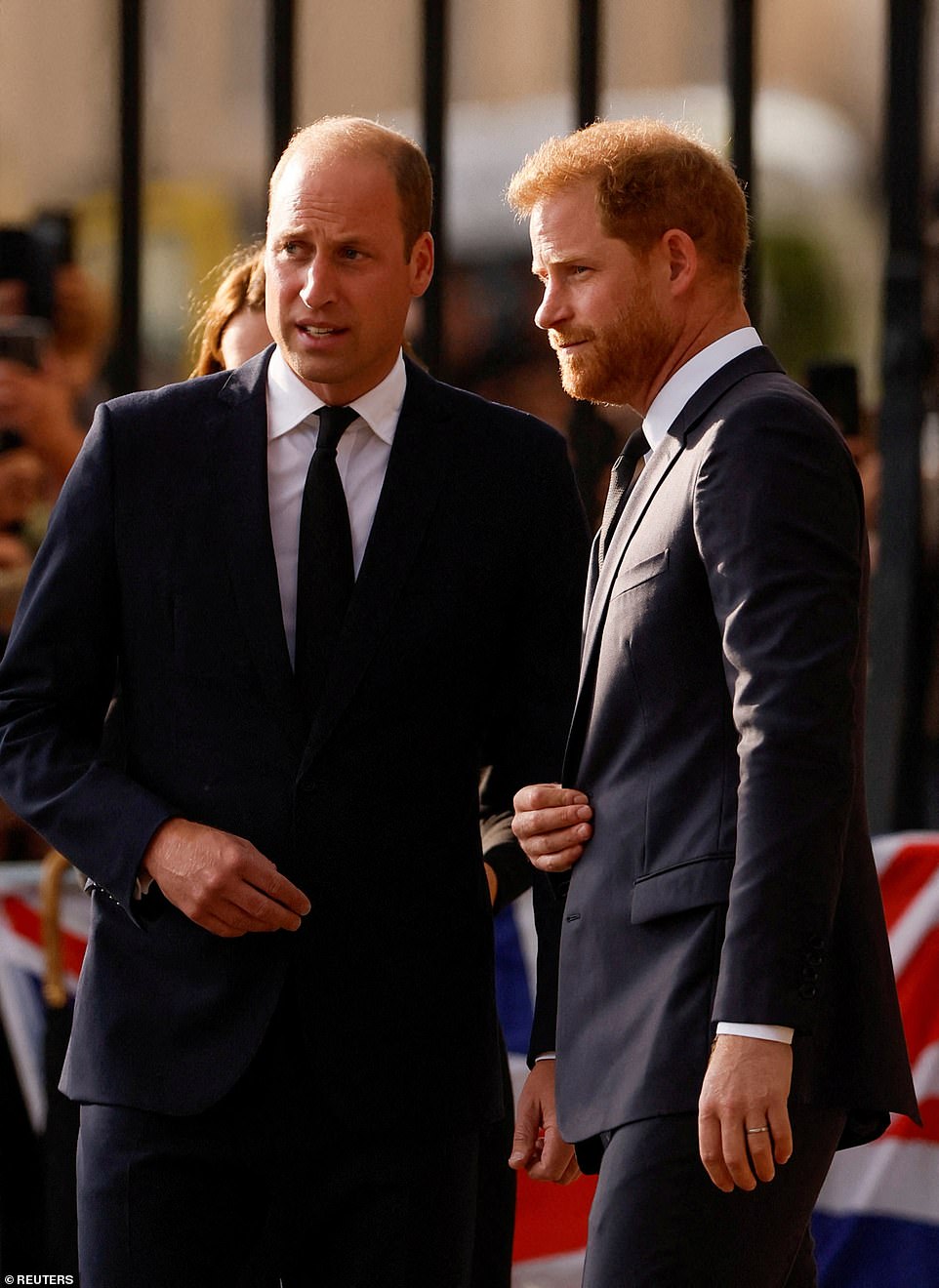 One well-wisher said: 'We couldn't believe it when the gates opened, and we saw William and Harry walk down with Meghan and Kate. I'll be honest there was a little bit of a groan when Harry and Meghan came down our side, but I passed him a bunch of flowers and he was happy to take them.'