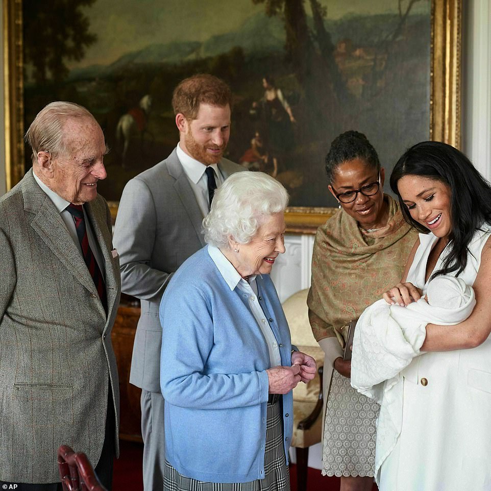 ARCHIE MOUNTBATTEN-WINDSOR: Archie Harrison Mountbatten-Windsor (here being held my Meghan Markle) is the first child of the Duke and Duchess of Sussex. He was born at Portland Hospital in London in 2019. The Queen was among the first members of the royal family to meet Archie when the couple brought him to Windsor Castle days after his birth. Archie had lived with his parents at Frogmore Cottage in Windsor and joined them on their tour of southern Africa in September 2019.