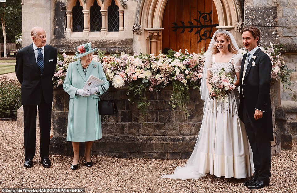 She also worked as an associate at Sandbridge Capital, a small consumer focused private equity firm, and as a business development associate at Sony Pictures Television until she resigned in 2014. In a sign of her closeness to the Queen, the monarch offered to hold Beatrice's wedding reception at Buckingham Palace in 2020 (pictured). She married Edoardo Mapelli Mozzi in a private ceremony at Windsor Castle in July 2020 with the Queen and Prince Philip in attendance. Beatrice shared just a few photographs of the big day - and poignantly, in a further indication of her bond with the Queen, one alongside the monarch and Prince Philip. The Queen's gesture in lending Beatrice a vintage Norman Hartnell gown, which she herself wore almost 60 years ago to the film premiere of Lawrence Of Arabia, meant a lot.