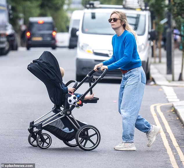 Dressed casually for the outing, the mother-of-one donned a blue knitted jumper and baggy jeans