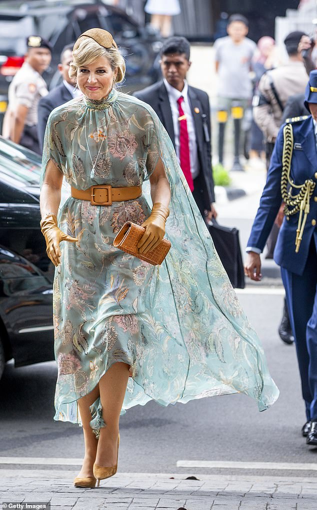 Queen Maxima sported a sheer floral cape dress when she visited Pipiltin chocolate factory in March 2020