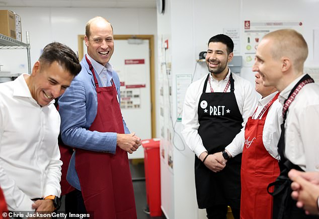 The Prince of Wales laughs with Pret employees at the branch in Bournemouth